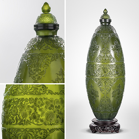 Eggshell-thin dark green nephrite vase is decorated with lotus branches.