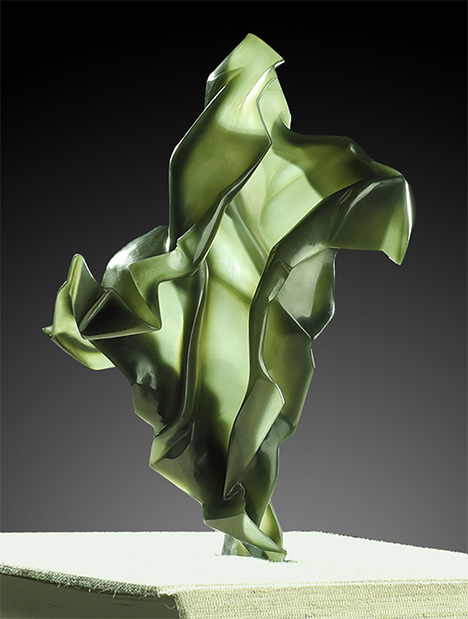 Eggshell carving showcases the transparent feel of creased paper in this nephrite work of art.