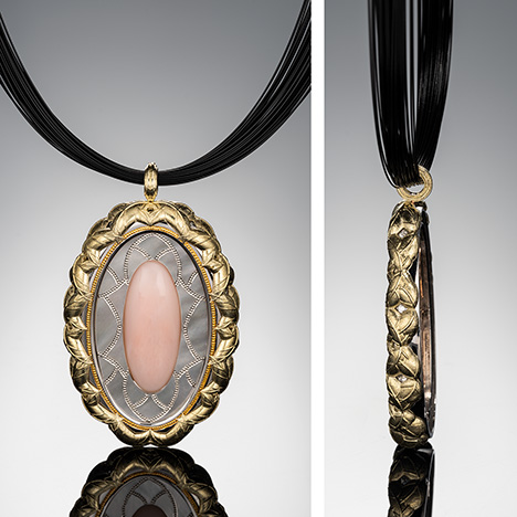Zoltan David’s “Mirror Mirror” pendant features pink opal, diamonds, mother-of-pearl, and various metals.