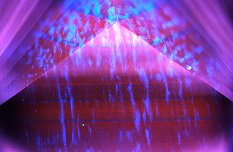 Seven growth layers and irregular blue banding seen under deep short-wave UV excitation.