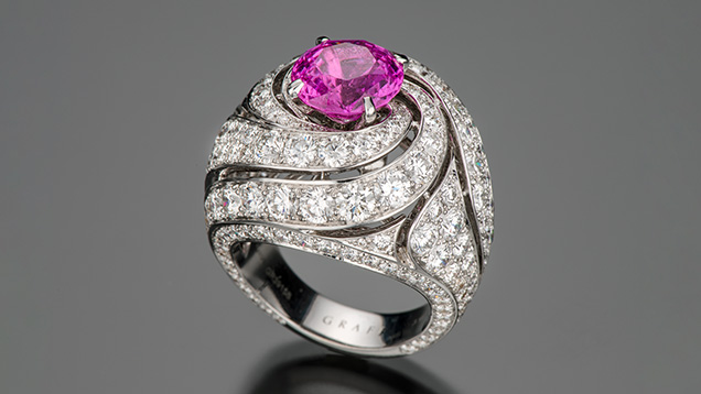 Figure 1. This ring from Graff features a 3.95 ct pink sapphire and 7.5 carats of diamond in a spiral design. Photo by Robert Weldon; courtesy of Jewelerette Co.