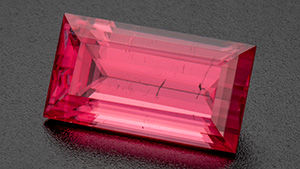 A 7.94 ct rectangular step-cut rhodochrosite from the Sweet Home mine in Colorado’s Alma Mining District. Photo by Robert Weldon; courtesy of Barker & Co.