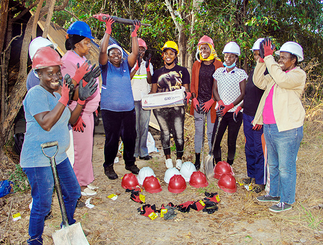 Figure 2. Artisanal emerald miners in Zambia celebrate a donation by Virtu Gem of safety equipment and a jackhammer. Photo courtesy of Virtu Gem.