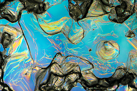 Figure 25. Hillocky structure on the surface of a rough sapphire from Rock Creek shown with differential interference contrast imaging. Photomicrograph by Aaron Palke; field of view 2.88 mm.