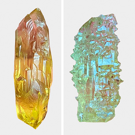 Figure A-2. Yellow and greenish yellow beryl crystals from the Volodarsk mining area in Ukraine showing heavily dissolved surface patterns due to natural etching and dissolution subsequent to the crystal growth process. Crystal length: 61 mm (left) and 43 mm (right). Photos by Peter Lyckberg.