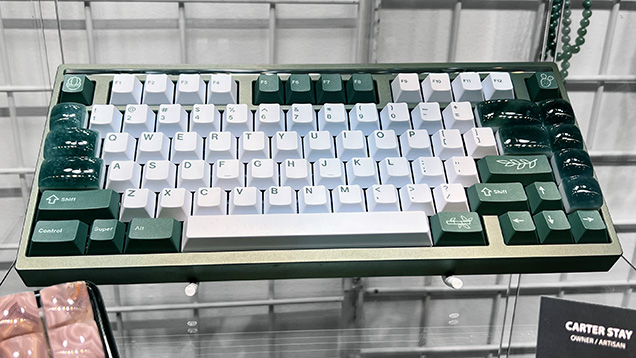 Figure 1. Mechanical keyboard with select jade keycaps. Photo by Lisa Kennedy; courtesy of Carter Stay, Keycap Quarry.