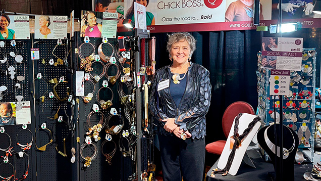 Figure 1. Pat Pannell, founder of Chick Boss, at the Colors of the Stone show. Photo by Loren Kayfetz.