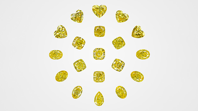 Figure 1. Selection of Fancy Vivid yellow HPHT-grown diamonds, ranging from 1.03 ct to 2.32 ct. Photo by Johnny Leung.