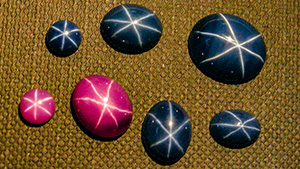 Assortment of Linde synthetic star rubies and sapphires