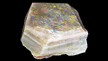 Color bars on top and sides of 3,019 ct rough opal