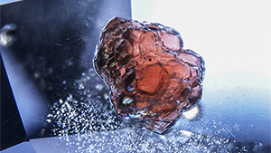 Pyrope-almandine garnet crystal inclusion in sapphire.