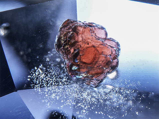 Pyrope-Almandine Garnet in Sapphire Host | Gems & Gemology