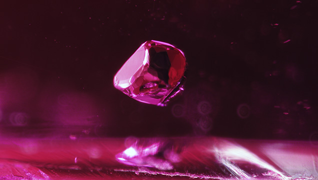 Opaque black-red crystals in Mozambican rubies