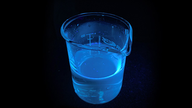 Blue fluorescence emitted by optical brightener solution
