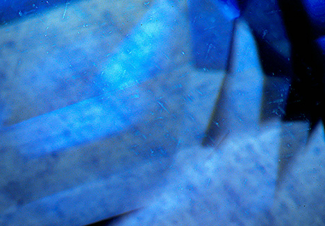 Heat treatment creates blue coloration around partially dissolved silk in sapphire.