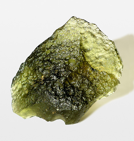 This specimen shows the typical texture of rough ekanite.