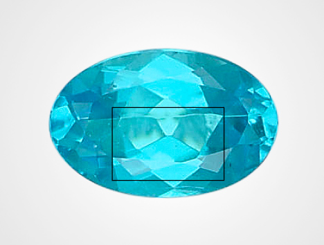 Figure 1. A moiré-pattern metallic inclusion was observed in the marked area of the 0.33 ct Paraíba tourmaline. Photo by Shunsuke Nagai.