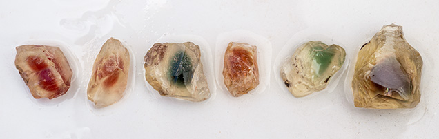 Figure 6. Rough Oregon sunstone from the Sunstone Butte mine showing a wide range of colors. Photo by Robert Weldon.