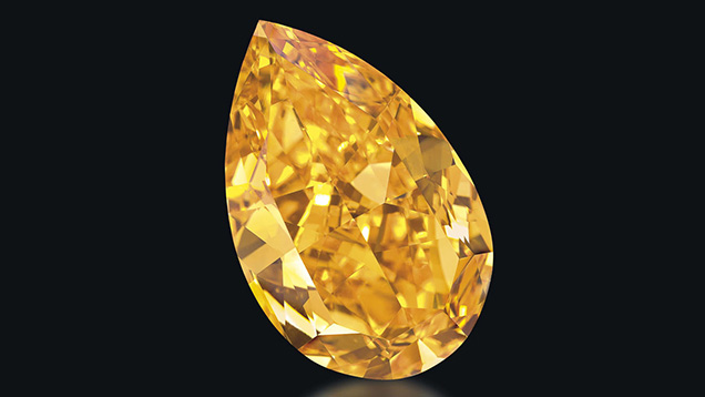 「オレンジ」と呼ばれる14.82カラットのファンシービビッドオレンジ色のダイヤモンドは、カラット当たり240万ドル（2.4億円）を記録した。 それは、ジュネーブにおけるChristie’s（クリスティーズ）の11月12日のオークションの目玉商品でしたが、そのオークションでは 1 億 2,540 万ドル（125.4億円）という過去最高のオークション総額をもたらした。 写真：Christie’s Images Ltd. 2013、Denis Hayoun Diode SA Genevaのご厚意。 Christie’s Images Ltd. 2013（クリスティーズイメージ社）、 提供：Denis Hayoun Diode SA Geneva
