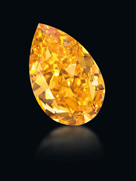 The Orange, a GIA-graded 14.82 carat fancy vivid orange diamond, sold for $35.5 million at a Christie’s auction Nov.11, 2013 in Geneva. Photo courtesy of Denis Hayoun Diode SA Geneva