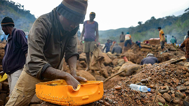 Malagasy miner in search of rubies.