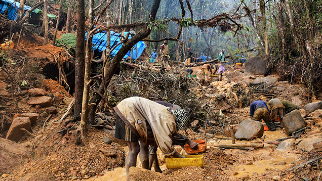 Malagasy miners washing gem-rich gravels.