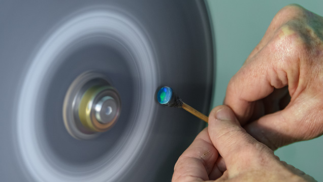 Polishing an opal cabochon