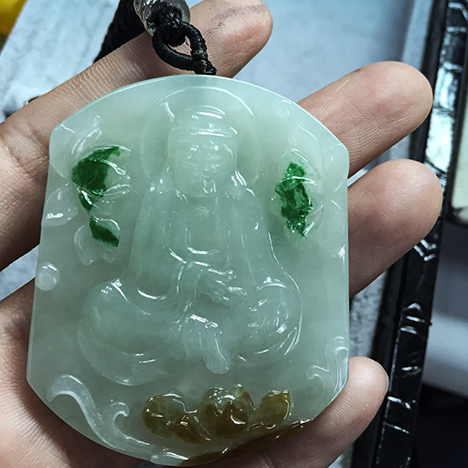 Decorated jadeite pendant.