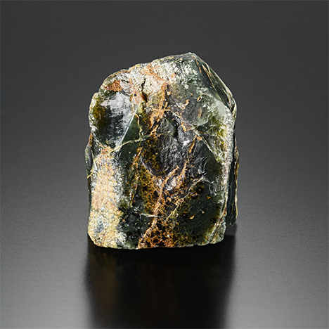 Polished rough dark green common opal weighing 28.16 ct.