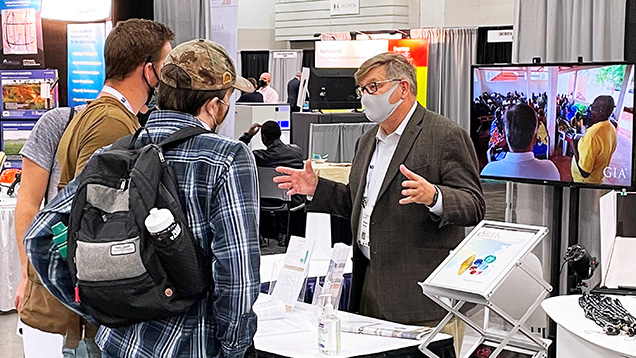 Visitors at the GIA booth at GSA.