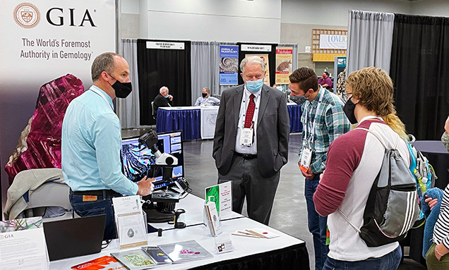 Visitors at the GIA booth at GSA.