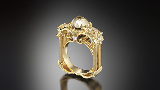 Figure 22. This ring features a 14K gold setting and a white DavinChi Cut topaz. Courtesy of Chi Huynh.