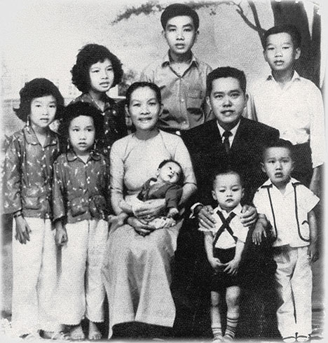 Figure 3. Chi Huynh as an infant with his parents and siblings in South Vietnam. Courtesy of Chi Huynh.