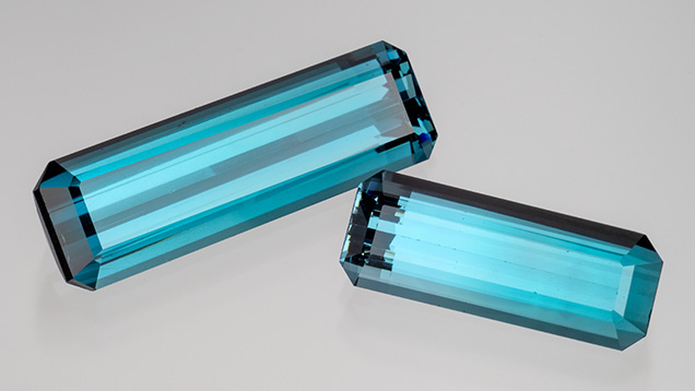 Figure 1. These indicolite tourmalines (9.27 and 6.16 ct) from Zambia are among the variety of gems Virtu Gem offers. Photo by Robert Weldon.