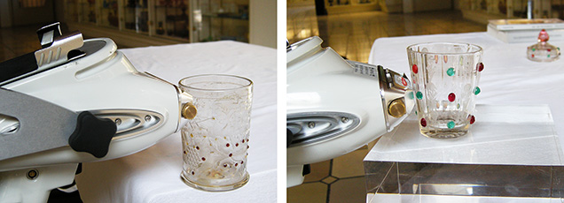 Figure 12. Examination of the beaker (left) and the lidded goblet (right) in the exhibition rooms of the Passau Glass Museum using a portable X-ray fluorescence analyzer. Photos by K. Schmetzer.