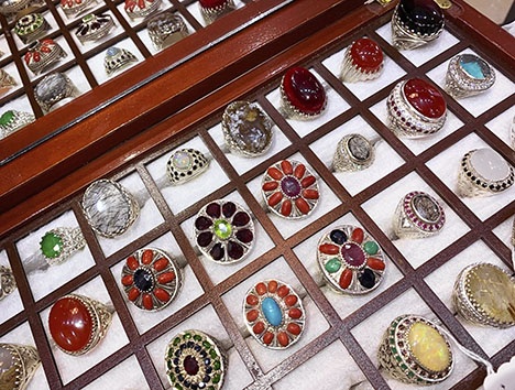 Figure 3. Nearly all of the stones in these rings offered in markets throughout Pakistan are synthetics or simulants or have been enhanced. Photo by Talha H. Bakht.
