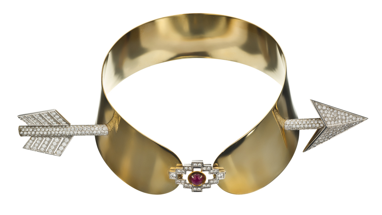 Gold collar with diamond encrusted arrow and ruby emblem