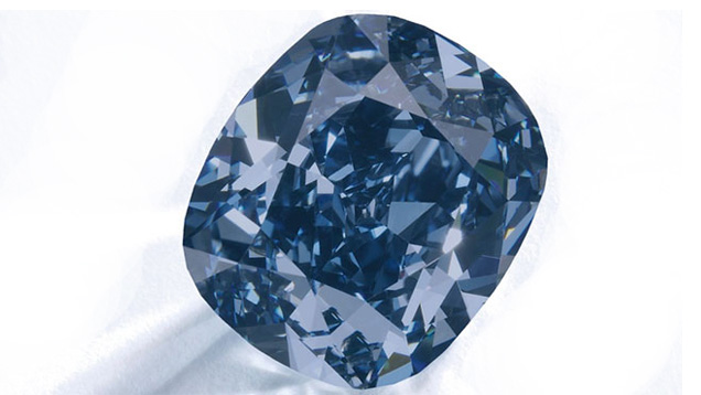 The $48 million Blue Moon Josephine, a 12.08 ct  Fancy Vivid blue, has become the most expensive gemstone ever sold at auction. Its $4 million per carat price exceeded the previous record by $1 million. Photo courtesy Sotheby’s