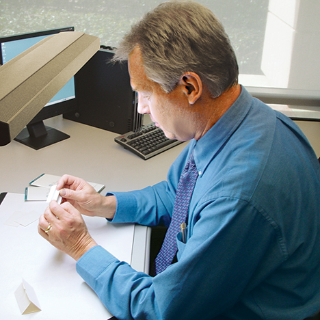 Observer assessing diamond appearance and cut quality