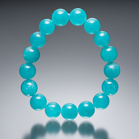 In this high-quality translucent amazonite bracelet, the average bead diameter is 12 mm. Photo by Kevin Schumacher.