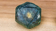 The rough sapphire crystal as it was mined.